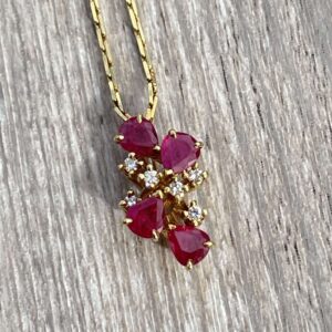 Collier rubis taille poire diamants en or 18 carats d’occasion