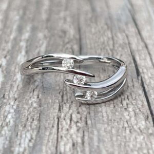 Bague trilogie de diamants en or 18 carats d’occasion