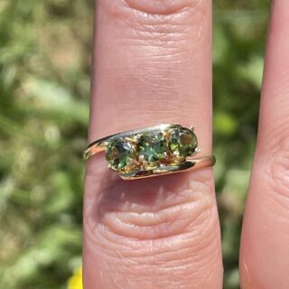 Bague trilogie de péridots en or 18 carats d&rsquo;occasion