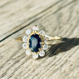 Bague Marguerite saphirs diamants en or 18 carats d’occasion