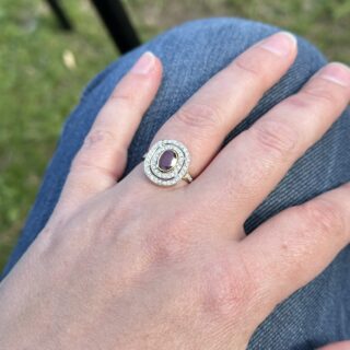 Bague rubis double entourage de diamants en or 18 carats