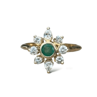 Bague marguerite en or 18 carats d’occasion avec émeraude et diamants