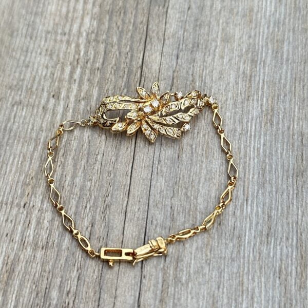 Bracelet motif floral en or 18 carats serti de diamants
