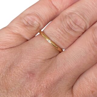 Bague en or jaune 18 carats sertie d’un diamant