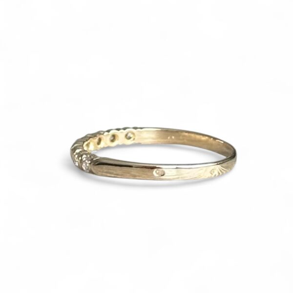 Demi-alliance en or jaune 18 carats et diamants