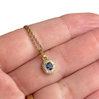 Pendentif or 18 carats saphir ovale entourage diamants